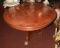 Wood dining table, claw feet, burled wood accents,