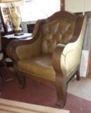 Oversized wood chair w/ vinyl upholstery