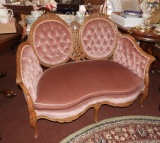 Loveseat, mauve upholstery, wood accents, excellen