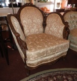 Upholstered chair w/ carved wood accents, 37