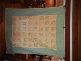 Embroidered quilt with border, 64x80