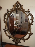 Framed oval mirror, 46