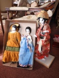 3 oriental dolls, 1 with stand