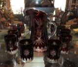 Ruby red to clear cut glass pitcher & 6 glasses