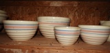 4 crockery nesting bowls marked USA