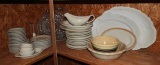 Large group of stoneware dishes