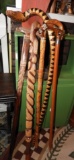 Group of 5 canes, mostly hand carved or painted