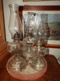 3 clear glass oil lamps