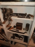 Contents of shelves including sausage grinders