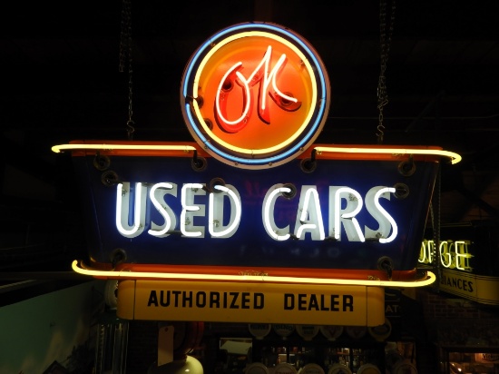 OK Used Cars "Authorized Dealer" neon sign