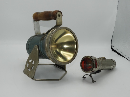 Vintage metal emergency flashlight embossed