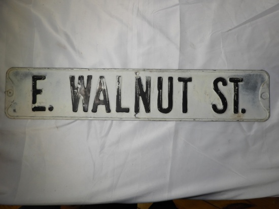Stamped steel street sign "E Walnut" 30"x6"