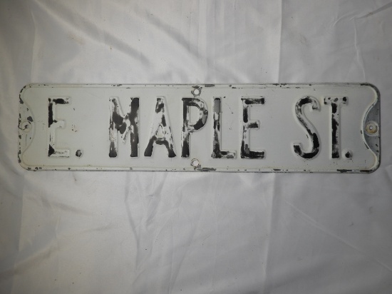 Stamped steel street sign "E Maple St." 24"x6"