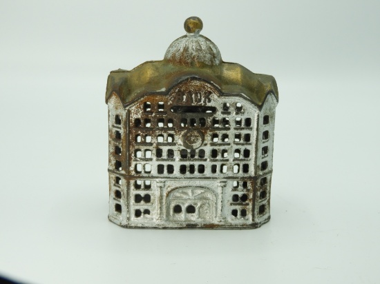 Cast iron figural coin bank