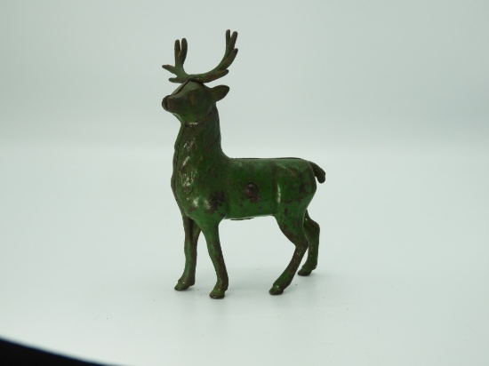 Cast iron deer bank w/ green patina