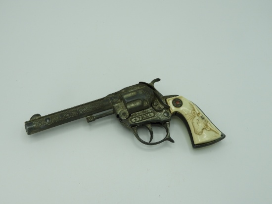 Child's toy pistol "Tex" w/ longhorn plastic grips