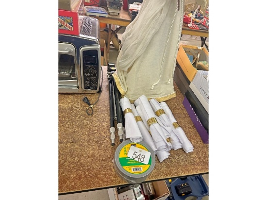 Christmas Figure, Tripod and Napkins and Rings and Duct Tape