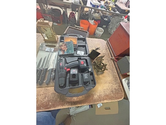 Cordless Drill, CDs and Bookends