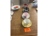 Row of Cups & Saucers