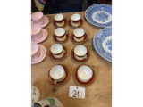 Row of Aynsley Cups & Saucers