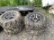 Set of Mud Lite 26x11R12 & 26x9R12 Tires on Polaris Rims Plus Spare
