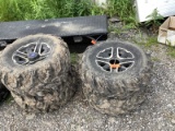 Set of Mud Lite 26x11R12 & 26x9R12 Tires on Polaris Rims Plus Spare