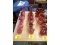 Row of Cranberry Glass