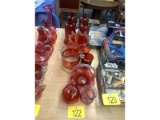 Row of Cranberry Glass