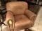 BROWN LEATHER ARMCHAIR WITH TACKED ARMS & OTTOMAN