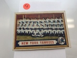 BASEBALL CARD - 1957 TOPPS #97 - NEW YORK YANKEES TEAM - GRADE 3-5