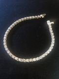 CLEAN NATURAL DIAMOND TENNIS BRACELET - 14K YELLOW GOLD SETTING (6.7 DWT) - ROUND DIAMONDS (5CT TW)