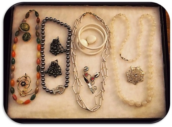 Lot of Necklaces, Earrings, Bracelets and Brooches with Beads, Milk Glass, and Rhinestones.