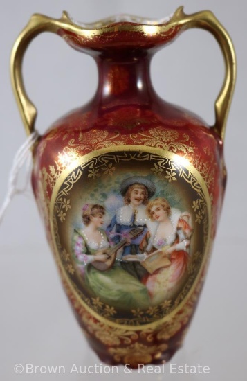 Mrkd. Prov Saxe/E.S. Germany 5"h vase w/dbl. gold handles, burgandy finish with Musicians/Courting