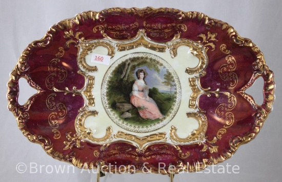 Mrkd. O.S. St Kilian 13"l x 8.5"w bun tray, scenic d?cor of woman sitting on long framed by heavy