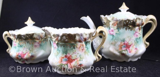 R.S. Steeple Mold 6 tea set: 6"h teapot, 3.5"h creamer and cov. sugar, mixed floral d?cor, green