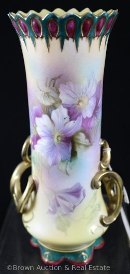 Mrkd. Royal Vienna Germany 7.5"h vase with elaborate dbl. gold handles, lavender floral d?cor on