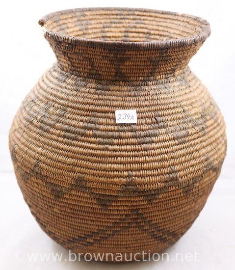 Native American 10"h vase-shaped basket (some wear at top rim)