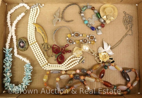 Box lot of costume jewelry incl. necklaces and brooches