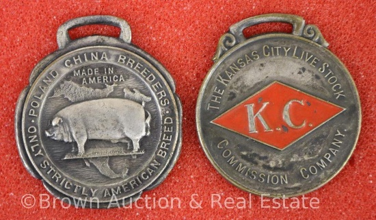 (2) Watch fobs: KC Livestock Commission and American Poland-China Record w/pig