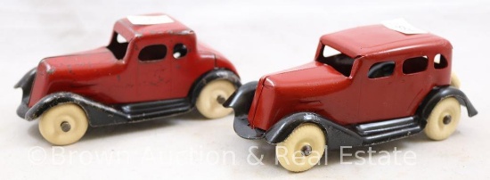 (2) Pressed steel 4.5"l toy cars, 1-original and 1-repaint, rubber tires