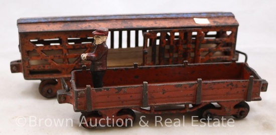 (2) Cast Iron railroad cars incl. 11"l livestock and 9.5"l car with engineer