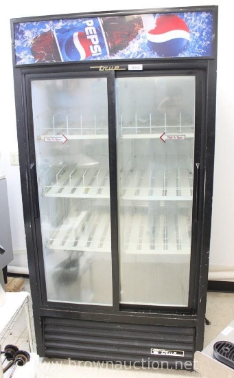 Refrigerated upright Pepsi drink cooler