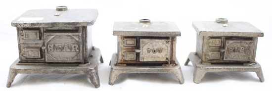 (3) cast iron miniature stoves, 2 sizes, embossed STAR, BABY and TOT