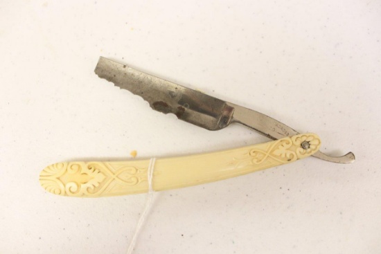 Antoni Tadross & Co. straight razor, carved celluloid handle (considerable