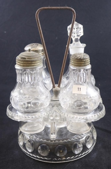 Crystal Castor set with 4 matching bottles (base has some chips)