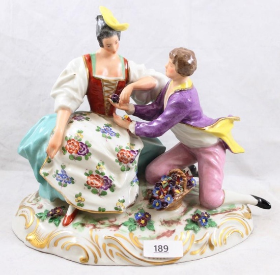 Porcelain Victorian figurine of courting couple, 7"h x 8"l, crossed arrows mark