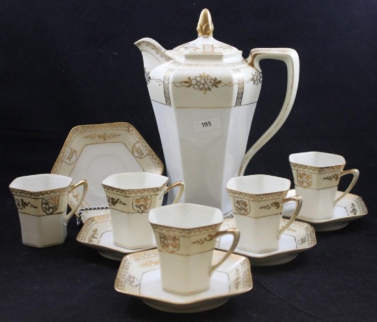 Mrkd. Noritake coffee set: 9.5"h pot with (5) cups and saucers, white 6-sided body with gold