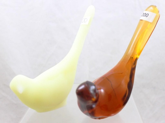 (2) Fenton glass bird figurines, 1-Custard Glass and 1-amber