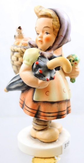 Mrkd. Friedel girl with umbrella 6"h figurine, paper label