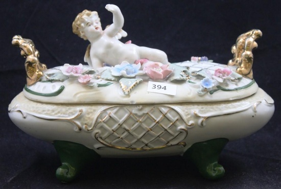 Capodimonte-style bowl w/lid, 9"l x 4.5"w x 5.5"h, lid features cherub and flowers (some flowers
